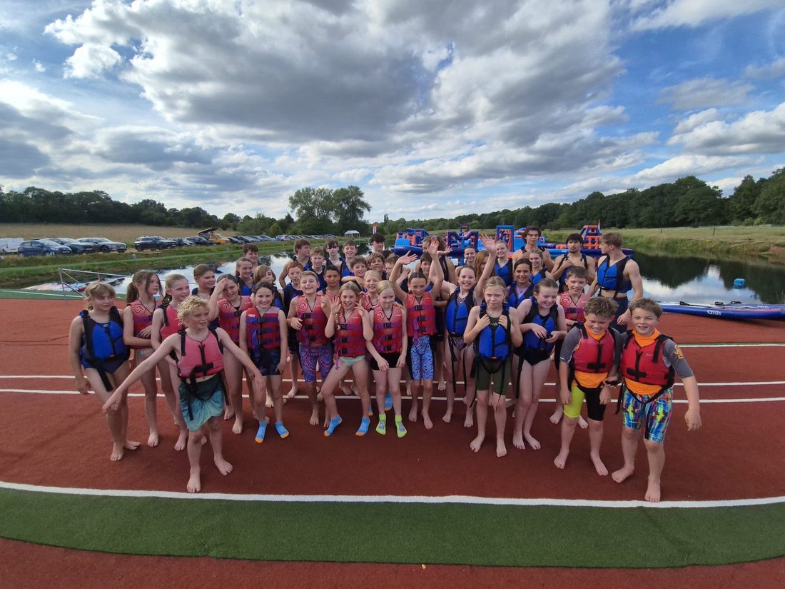 Northgate swimmers at the Lakeside Adventure Aquapark summer social