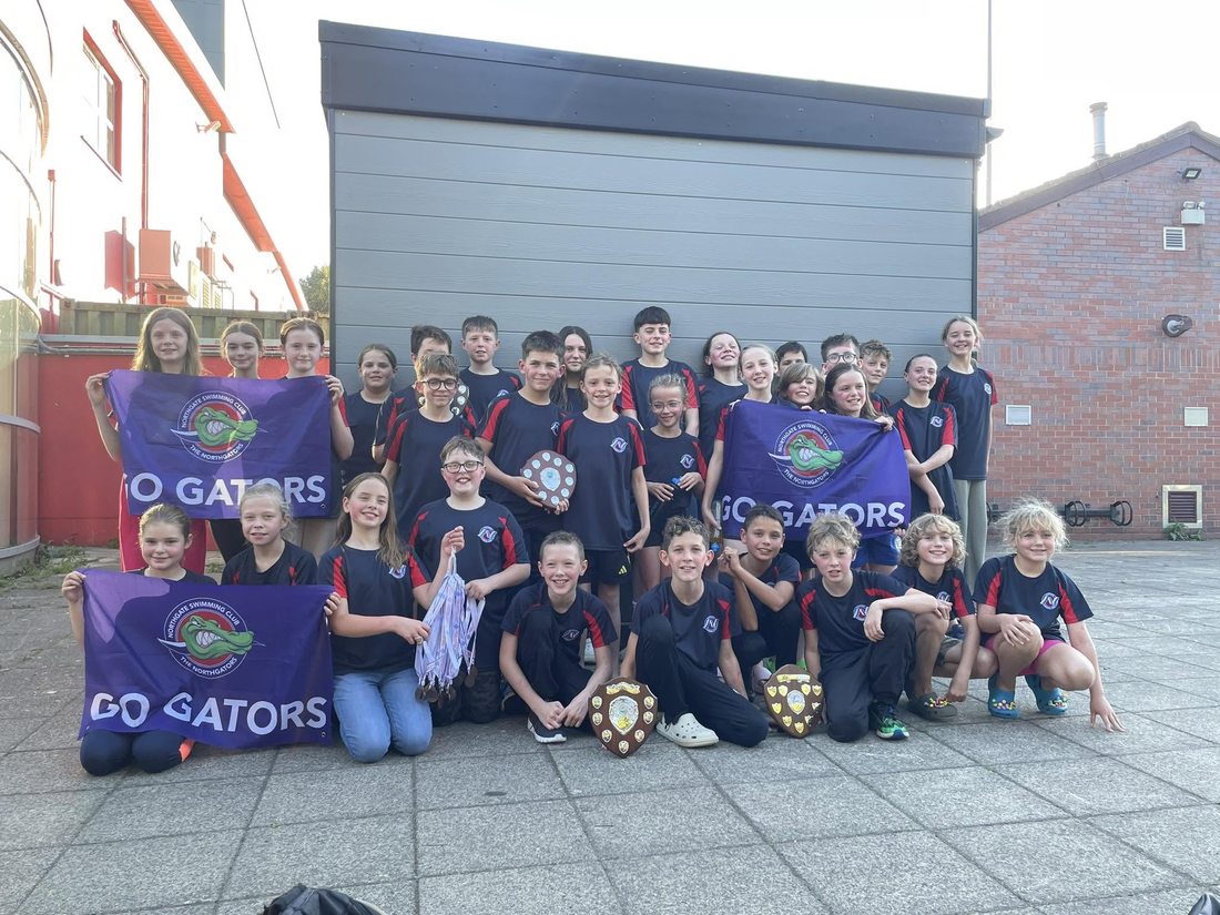 Northgate junior league team with their Division 1 promotion shields and medals